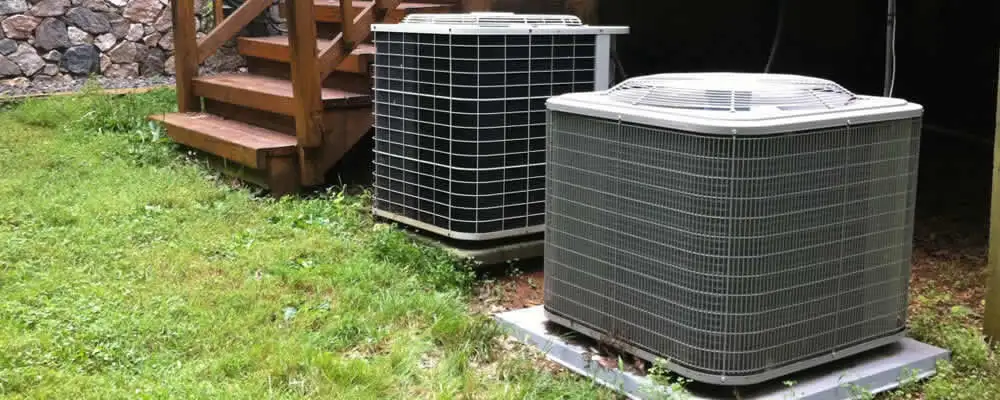 Heat pump installation and service units outside a home in Andover, MA